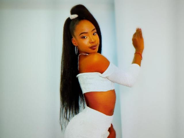 A modernist-style graphic with a bold, red-orange, and white emblem in the center. Clean lines, minimalistic, flat colors. The emblem has a subtle, abstract, geometric design.