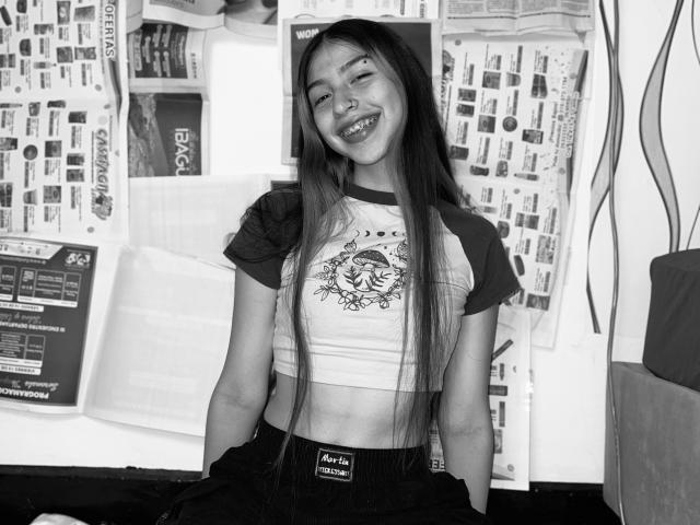 Digital illustration of a stylized, minimalist city logo with bold, white lettering. Central design features a simple, angular, black shape with a small, white emblem in the bottom right.