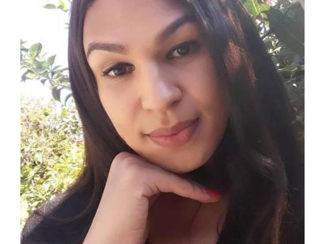 Flat, minimalist design of a large, red, rectangular emblem with a white, stylized "V" in the bottom right. Simple, bold colors and clean lines. StarTrans logo not visible.