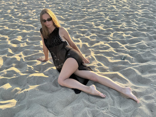 Digital art of a modern flag with a dark brown and beige color scheme. Flag has a minimalist design with a subtle "V" shape in the bottom right.