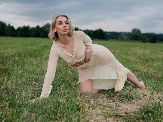 A flat, minimalist design with a large, red, letter "R" centered in the lower half. The red letter has a subtle gradient, darker at the top. Simple, clean.