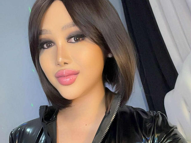 Digital art of a flat, minimalist design with a large, soft pink light source in the center. CallieStewart is not visible. The light source creates subtle shadows. Modern, minimalist style.