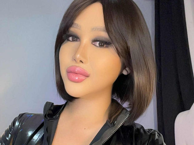 Digital art of a stylized, minimalist banner with a soft, warm pink and beige gradient. Simple, geometric shapes with clean lines. CallieStewart is not present. No additional objects.