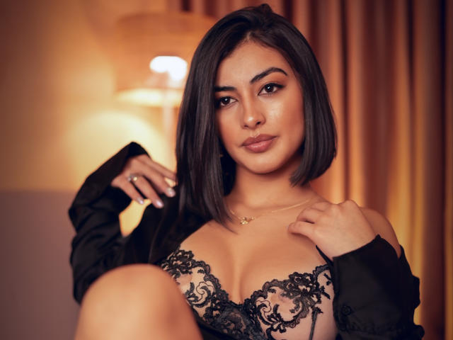 A flat, stylized letter "L" in bold, beige color with subtle shadowing. Simple, clean design with minimalistic features and a small, black "L" logo at the bottom.