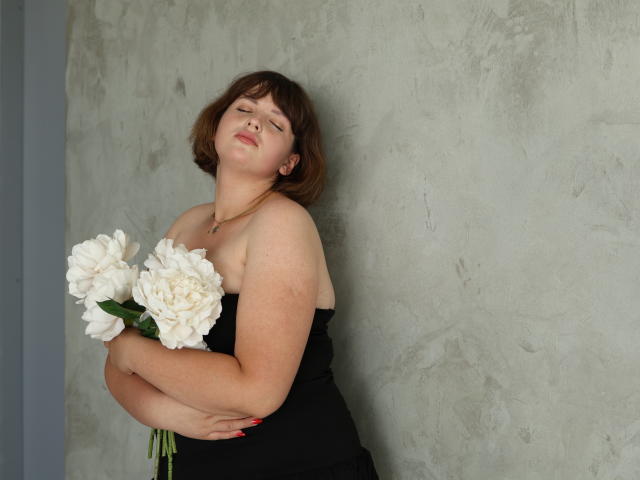 Flatter, stylized design of a large, red, and white letter "L" in the center. The letter has a three-dimensional, cut-out look with soft shadows and a minimalist style.