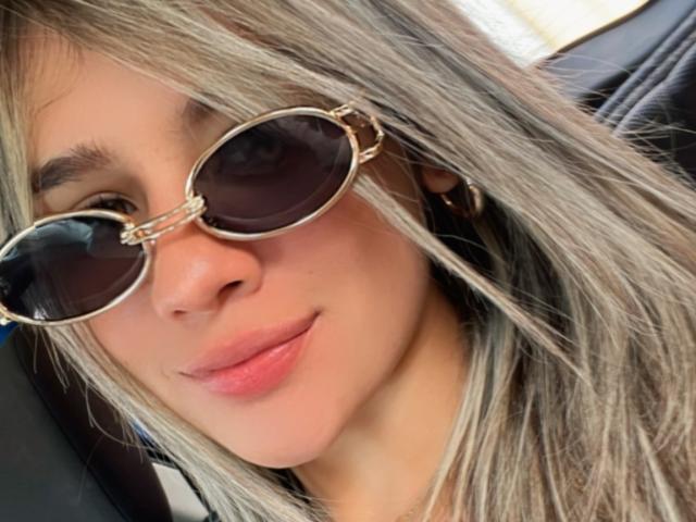 Digital artwork of a stylized red and white Japanese flag. Simple, bold shapes. Red triangle in top left, white triangle in bottom right. Clean lines, minimalistic. Slight gradient.