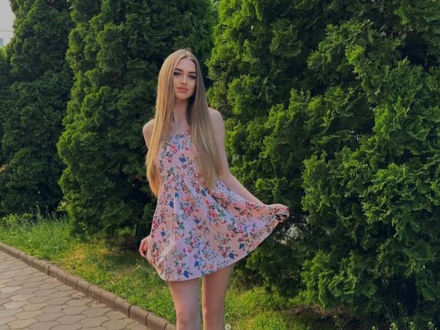 A digital illustration of a red Soviet-era hammer and sickle symbol in the center, with a bold, dark outline. The background is plain, emphasizing the emblem. Simple, solid colors.