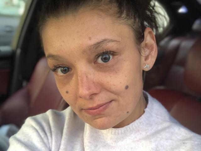 Digital art of five bold, white, semi-transparent letters (E, A, T, A, L) in a horizontal line. Letters are slightly raised, overlapping. Simple, clean, flat color style.