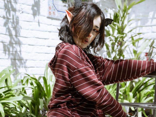 Digital art of abstract, geometric shapes in red, black, and white. Complex, overlapping lines create a layered effect. No visible textures or gradients. Modern, minimalist style.