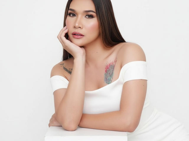 LexiSmithX with long brown hair, off-shoulder white top, hand on cheek, tattoo on right shoulder, looking at camera, white background, subtle pink lipstick, soft expression.