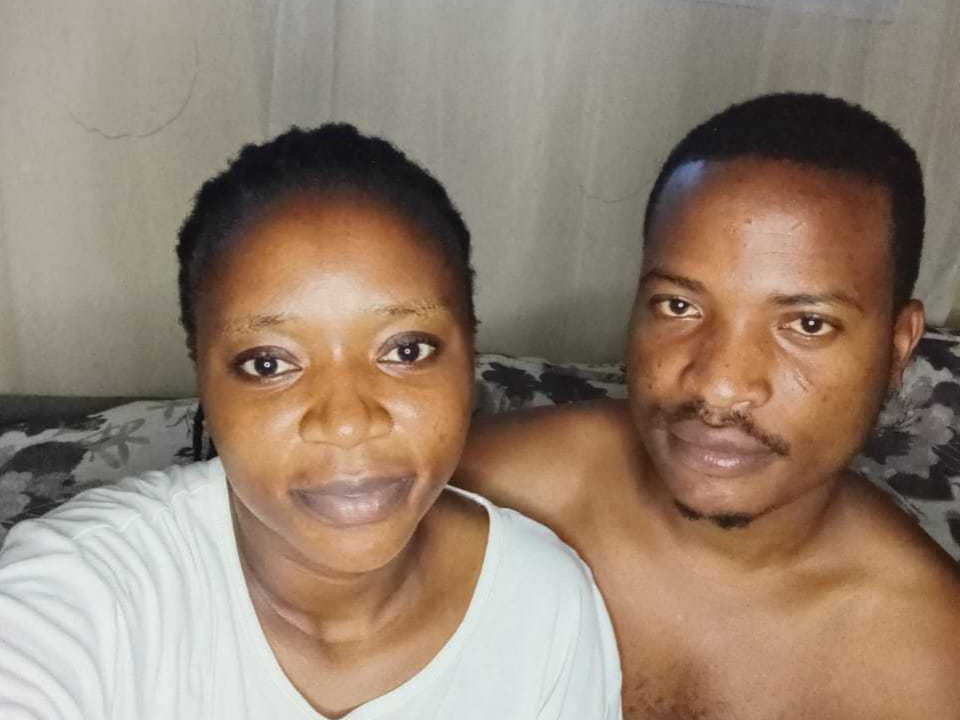 OrlandoTris with dark skin, short curly hair, wearing a white shirt, and OrlandoTris shirtless with a mustache, looking at the camera. OrlandoTris on the left, OrlandoTris on the right.