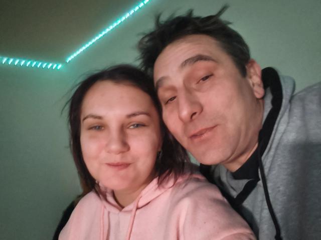 Elliefucku30-hot with brown hair and pale skin in a pink hoodie, and Elliefucku30-hot with dark hair and pale skin in a gray hoodie, both smiling at the camera.