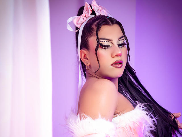 Digital artwork of StefyBratz, a sexy woman with long black hair in a ponytail, wearing a white lace bow and furry white off-shoulder top, purple and white background, intense gaze.