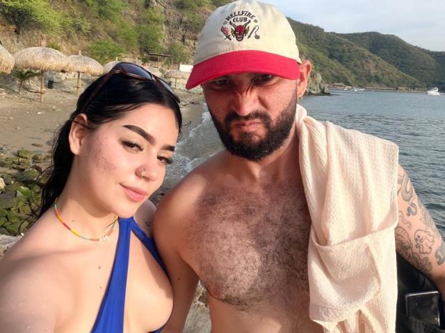 Digital illustration of a stylized, bold, flat-color design. EVAANDWALLE is centered with a large, red, and blue, abstract shape behind them. Simple, geometric lines. Minimal detail. Modern, minimalist style.