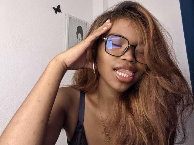 Close-up of a minimalist, flat-design letter "A" in a bold, serif typeface. Soft, gradient colors from light pink to dark pink. Simple, clean lines. Centered, with slight shadow.