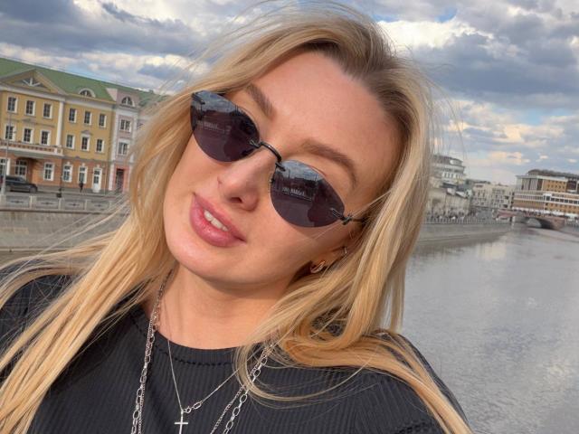 Digital artwork of a medieval-style flag with a red and white pattern. Centered, bold colors, simple design. Textures smooth, no gradients. RuthaLoil not present. Minimalistic, historical theme.