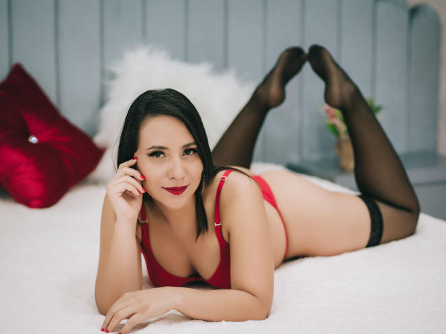 Digital art of four minimalist, flat-style, red and black coats of arms, centered and slightly overlapping. Each coat features a unique design, with varying red and black elements.