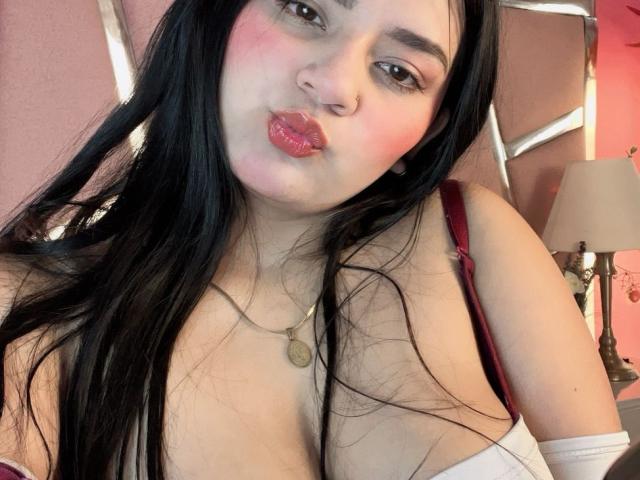 A minimalist, flat-style illustration with bold, solid colors. Central red and white emblem on a dark background. Simple, clean lines. No textures or gradients. NicolleVisconte is not present.