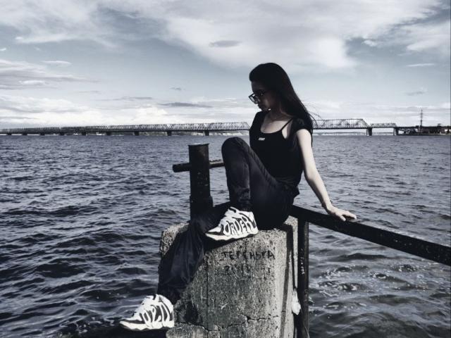 Digital art of a medieval-style coat of arms with a bold, dark red cross on a lighter red background. Simple, flat colors. GraciaPonting's design is clean and minimalistic.