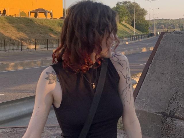 A digital illustration of a bold, stylized red and orange banner with a large, central white letter "P". The banner has a minimalist design with clean lines and solid colors.