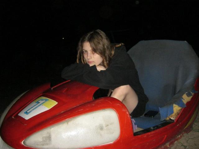 Close-up of a banner with a red and white pattern, centered in the image. The banner has a subtle gradient from red at the bottom to white at the top.