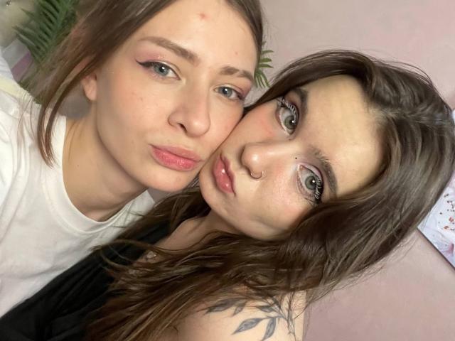 LuluMao with pouty pink lips, white shirt, and light skin, next to LuluMao with green eyes, nose ring, brown hair, black top, and leaf tattoo on shoulder.