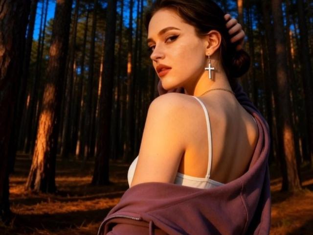 DorianCieslinski with her back to the camera, white bra, purple jacket, cross earrings, looking over shoulder, dark brown hair, forest, warm sunlight, showing her ass.