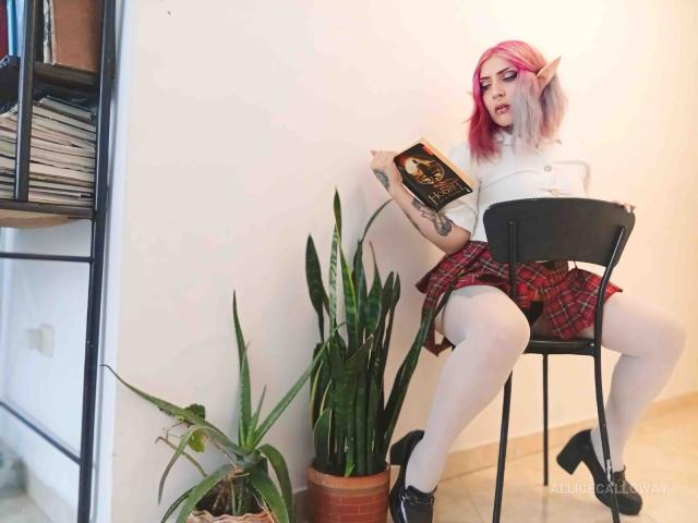 AliceCalloway with pink hair, elf ears, white top, red plaid skirt, white stockings, black heels, reading a book, sitting on a chair, potted plant, tattoo on right arm.