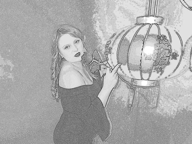 Oliviaaa with wavy hair, off-shoulder dress, and lipstick, holding a Chinese lantern with Asian characters, looking up with a slight smile, hands on lantern.
