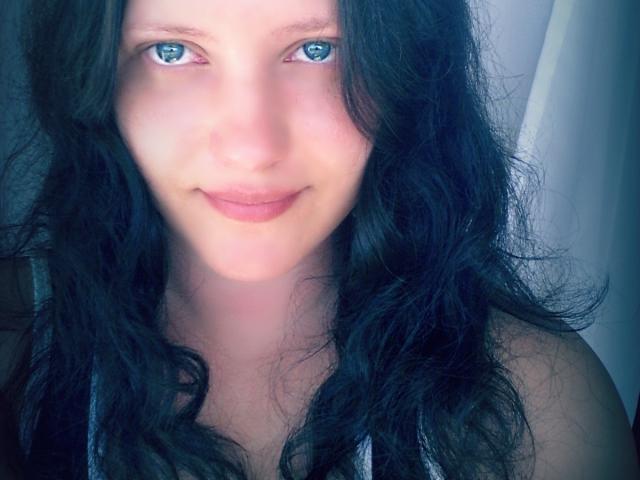 A flat, stylized, dark, and muted design featuring five overlapping, slightly translucent, vertical bars with a soft pink glow. Simple, minimalist composition. Bars are evenly spaced, creating a balanced pattern.