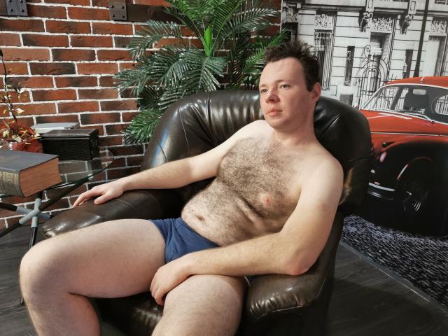 Digital illustration of a stylized red and white emblem with intricate, woven patterns. Central emblem is bold with a mix of solid and patterned sections. Minimalist, geometric design.