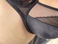 Barbarica's black mesh and fabric panties, showing a close-up of her butt with visible texture and lace detail, highlighting her buttcheeks and the fabric's pattern.