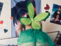 CristalZafiro's green fairy costume with leaf-shaped wings, green tutu, and bare back, showing her ass. Butterfly and heart wall decorations, and a Totori poster.
