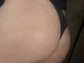 Barbarica's ass in black underwear, showing a visible seam on pale skin, with a slight stretch mark and a tight fit. The focus is on her butt.