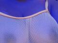 AmmyShtones' white mesh bra, showing her large, round, and prominent tits, with a light pink strap against her blue skin.