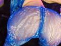 Kkole's blue, semi-transparent, lace-patterned ass is on display, with visible skin and a small dark mark in the center. Kkole's pose is on all fours.