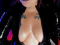 MoonDark69's shiny, glistening tits in a black, glossy, zip-down leather jacket with floral tattoos above her chest. She's wearing a choker with a small, dangling ring.