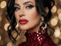 MistressTaylor with red sequined dress, black wavy hair, red lipstick, gold earrings, and bold eyeliner. Boxy face, sexy look, bokeh background, classy and alluring.