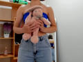 Steisii holding a pink stuffed bunny, wearing a blue strapless top and high-waisted denim shorts, with visible black stains on the shorts. Her boobs are partially visible.