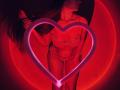 Tisia with long brown hair, wearing lace lingerie, stands in front of a glowing pink heart neon, highlighting her tits and ass in red lighting.