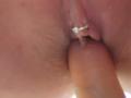 FrenchShanna's pussy, with a small silver ring on her clitoral hood, has a pinkish-brown erect cock partially inserted into her. The image is a blurry, close-up shot.